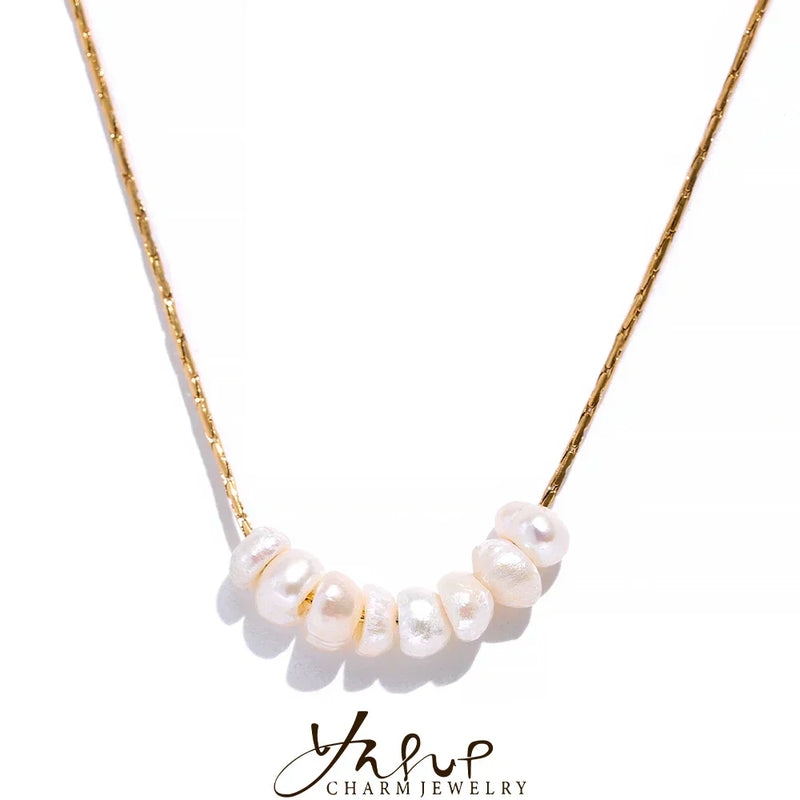 Collar de acero inoxidable y perlas